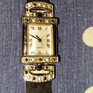 Vintage Avon Black and Silver Women's Watch